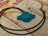 Ringed Planet Resin Necklace